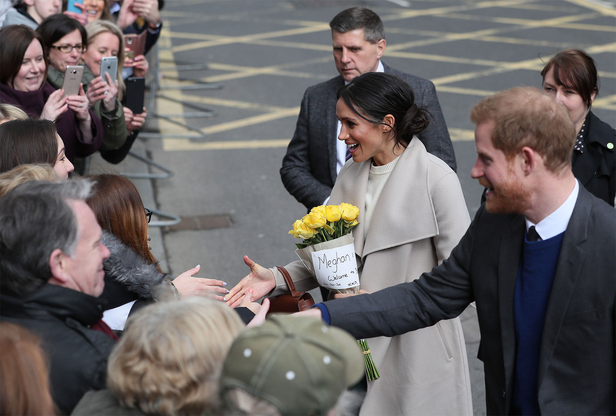 Meghan Markle Excitedly Shows Off Engagement Ring To Crowd In Belfast
